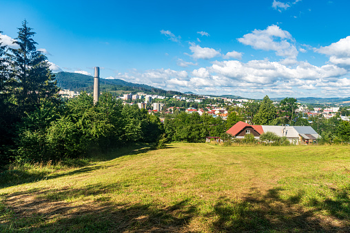 Cadca city in Slovakia during summer morning with blue sky and clouds