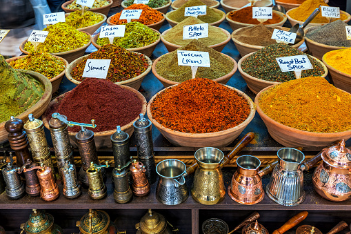 Traditional spices and artisanal kitchen utensils on famous market in Old City of Jerusalem, Israel.
