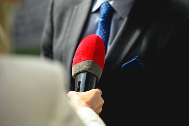 istock Journalist interviewing a politician 1431887141