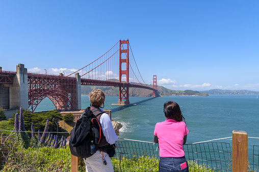 Travellers enjoying  the view of golden gate bridge in san francisco, california