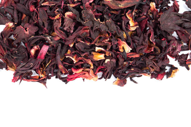 istock Bunch of dry hibiscus tea isolated on white background 1431893508
