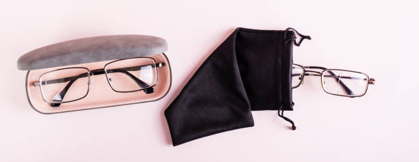 istock Storage concept - broken glasses in a soft case and whole glasses in a hard case. Top view. Web banner 1431901080