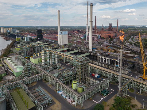 The Schwelgern coking plant in Duisburg, in operation since 2003, is one of the largest coking plants in the world. It produces 2.5 million tons of coke per year which are used by the neighboring steel mill; by-products are coke oven gas and coal tar. Total construction costs were approx. 800 million euros.