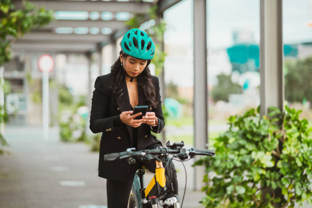 istock Woman on E-bike navigating on phone. 1431903217