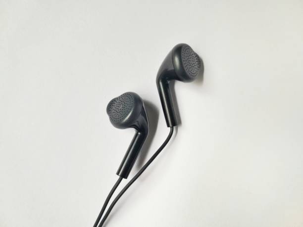 istock a pair of black earphones 1431903769
