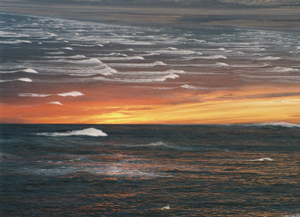 Sunset and breaking waves on a stormy day in North Devon, 35mm film and double exposure
