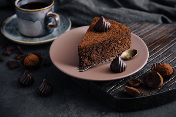 istock Piece of chocolate cake Truffle and tea cup 1431909365