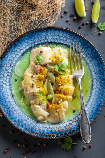 istock Tasty pickled fish serving with coriander and lime. 1431909415