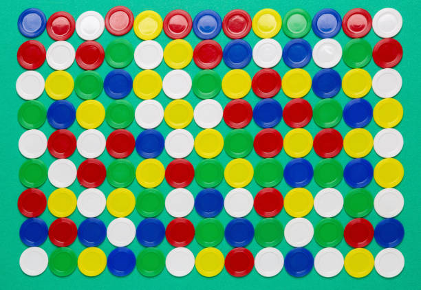 Colored tokens on green background