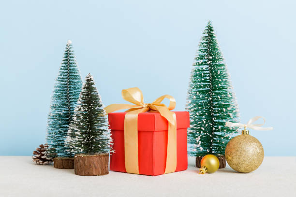 istock Christmas composition. craft Gift box, small tree, branches and craft DIY decorations on white background. New year concept. Christmas home decoration Flat lay, top view, copy space 1431912709