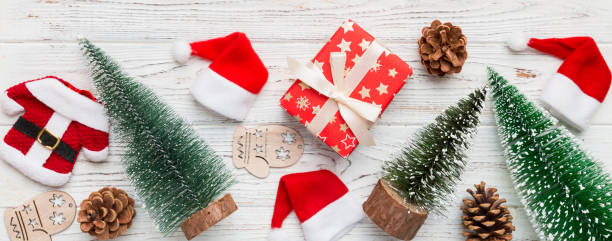 istock Flat lay composition with christmas trees on color background. Top view with copy space 1431913519