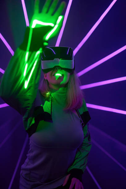 istock Woman is using virtual reality headset to access in metaverse. 1431914171