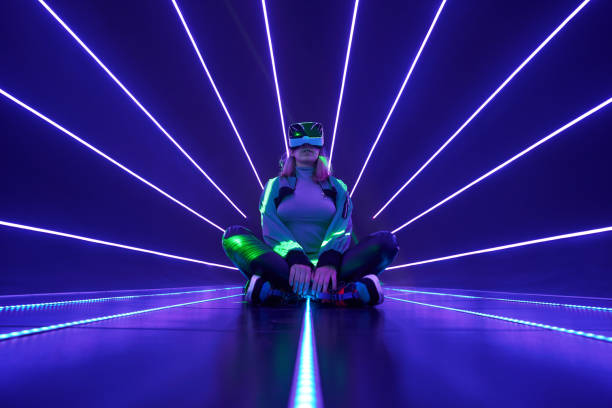 istock Woman is using virtual reality headset to access in metaverse. 1431914378
