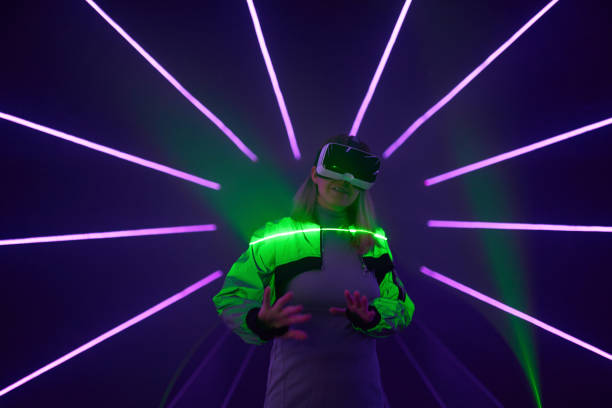 istock Woman is using virtual reality headset to access in metaverse. 1431914510
