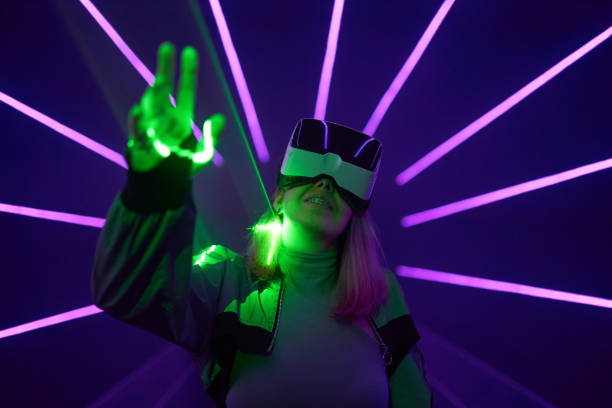 istock Woman is using virtual reality headset to access in metaverse. 1431915181