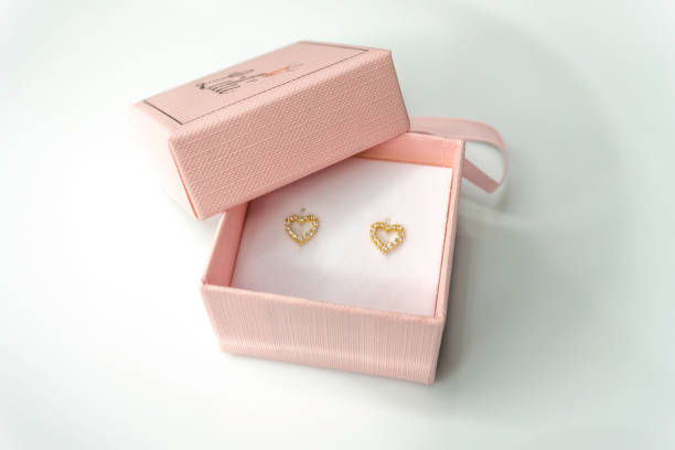 istock Heart shape earring in pink gift box for babies 1431915294