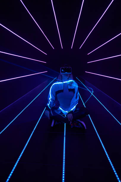 istock Woman is using virtual reality headset to access in metaverse. 1431915359