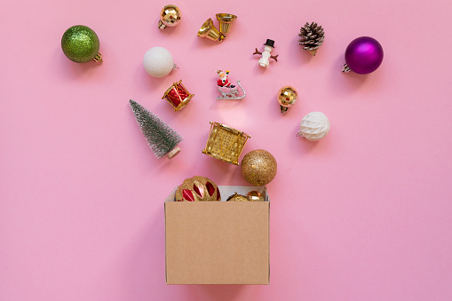 Christmas objects in a gift box