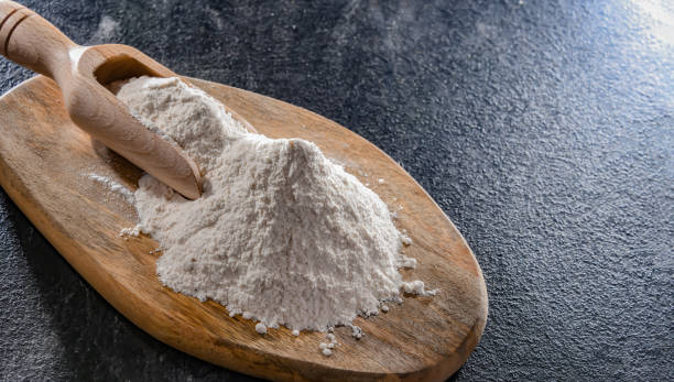 istock Wheat flour on the wooden cutting board 1431915931