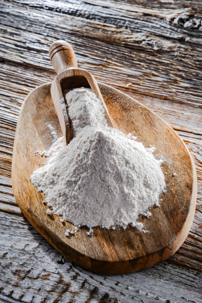 istock Wheat flour on the wooden cutting board 1431916489