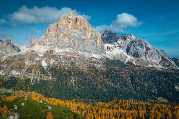 istock Autumn colorful larch forest and high mountains in background, Dolomites 1431918377