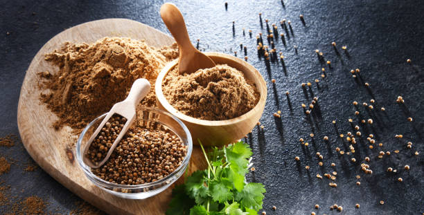 istock Ground coriander, its dried seeds and fresh leaves 1431919703