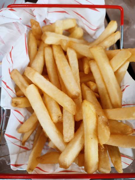 Hot fresh potato french fries serving at glasgow scotland england uk