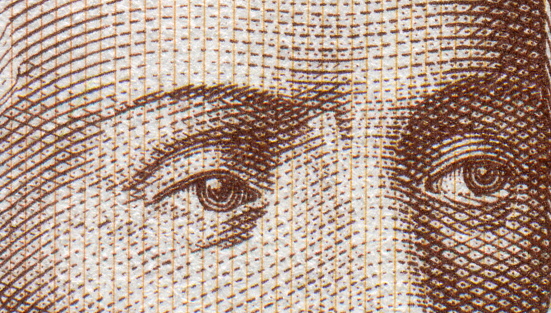 A drawing of Primoz Trubar as depicted on the Tolar banknote on a white background