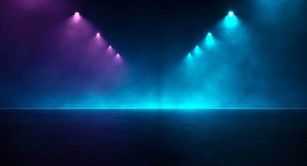 istock Abstract neon room with purple blue light beams down direction to copy space and illuminated stage product foreground 1431926709