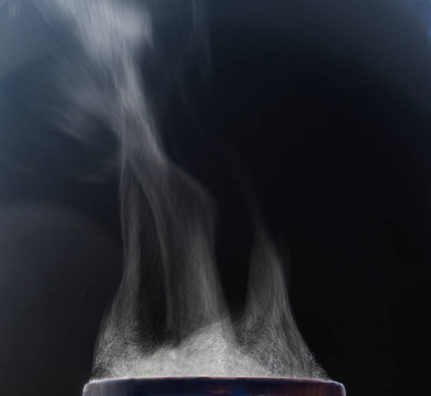 istock Steam texture. Liquid evaporation. Dark photo. 1431926961