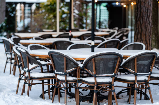 istock outdoor restaurant terrace covered with snow 1431928458