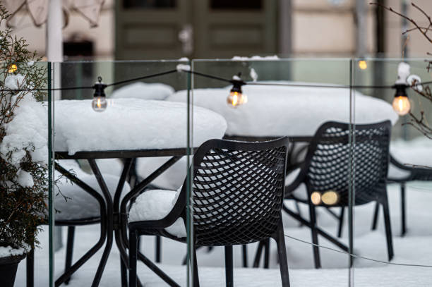 istock outdoor restaurant terrace covered with snow 1431929788