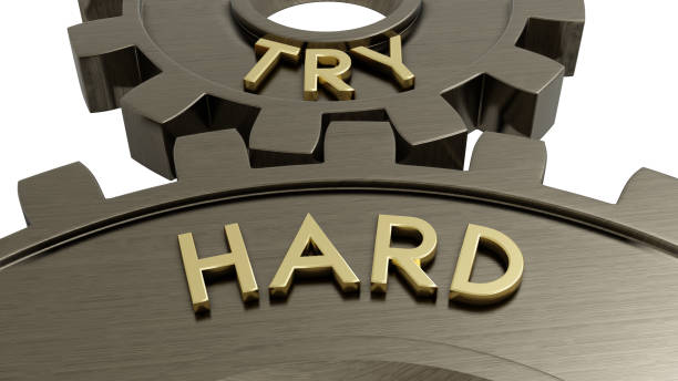 istock Try Hard Text on Gear Wheel on a white background with clipping path 8K 1431931453