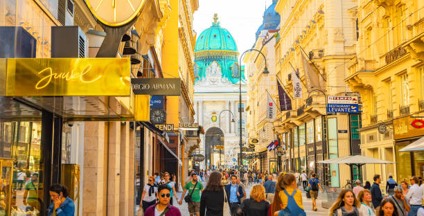 Shopping Kohlmarkt street in Vienna old town, Austria Vienna, Austria - 26 May, 2022: Famous shopping Kohlmarkt street with many luxury brand stores people shopping in graben street vienna austria stock pictures, royalty-free photos & images