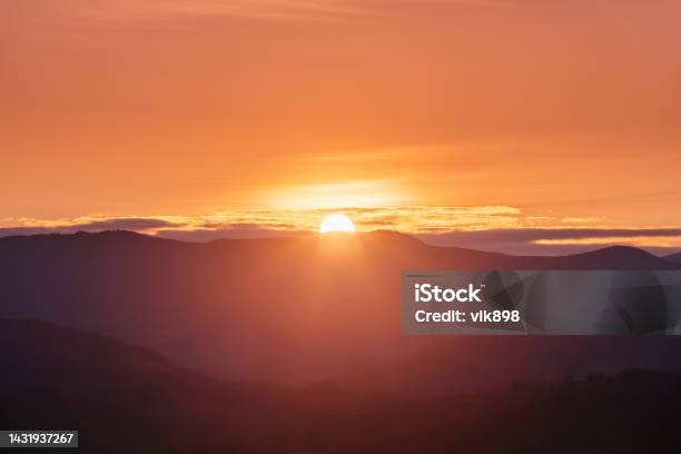 Beautiful Sunrise Sun Rays Enlighten The Meadow With Trees Spring Morning Landscape With High Mountains Panoramic View Natural Scenery Wallpaper Background Touristic Place Carpathian Park Stock Photo - Download Image Now
