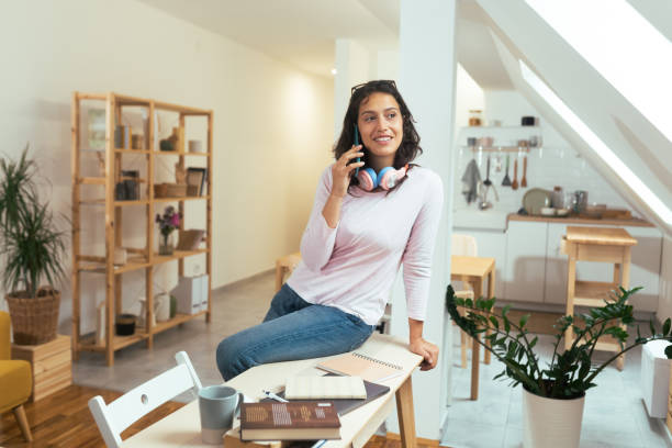 istock Beautiful young woman working from her home office 1431938986