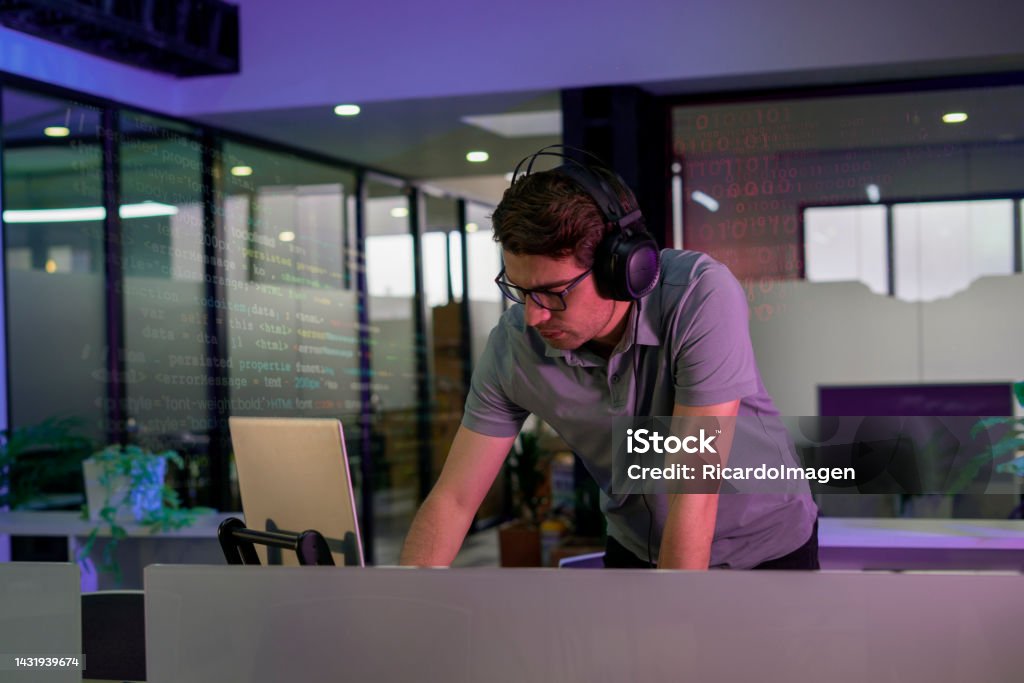 Young Programming Engineer Is Working Developing Codes For A New ...