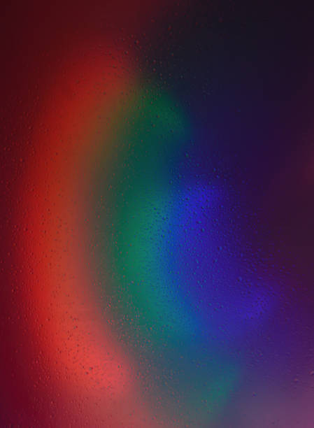 istock Transparent water drops on a colorful abstract background 1431941812