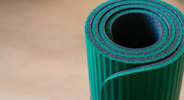 istock Roll yoga mat or mattress banner background 1431941870