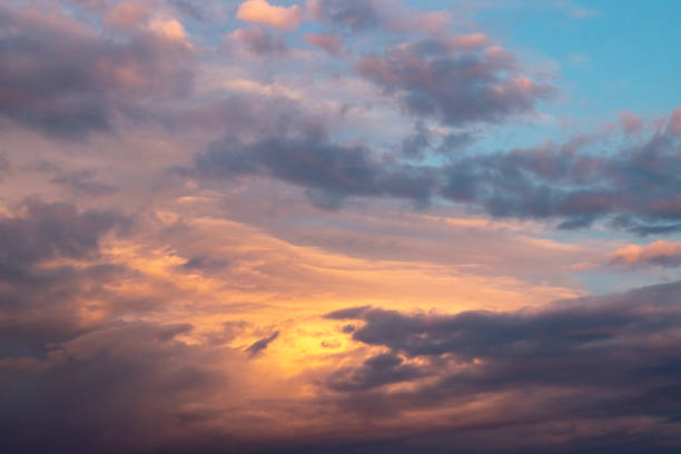 istock Texture of the sky with beautiful clouds, light from the sun at sunset 1431943560