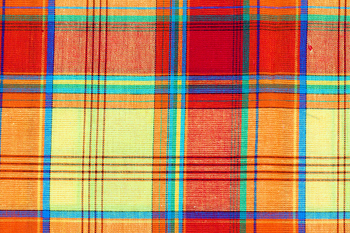 Spread madras tablecloths, traditional fabric of the Caribbean islands