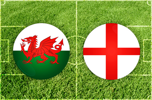 Welsh flag on a soccer ball over soccer field. Easy to crop for all your social media and design need.