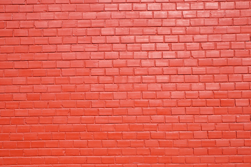 Dark red painted brick wall background