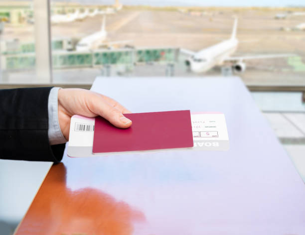 istock stewardess handing over her ID passport 1431954663