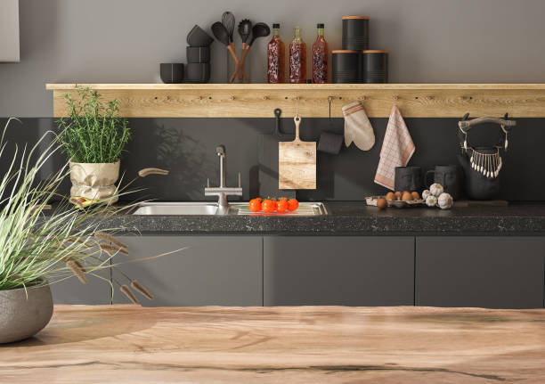 istock Dark grey kitchen design - detail of interior. Empty island or table countertop in modern kitchen room. 3d rendering 1431962688