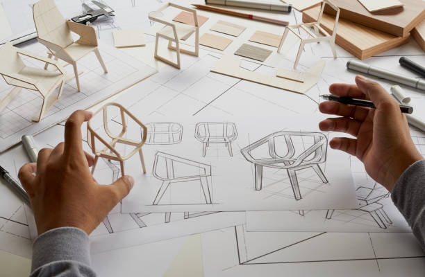 istock Designer sketching drawing design development product plan draft chair armchair Wingback Interior furniture prototype manufacturing production. designer studio concept . 1431968958