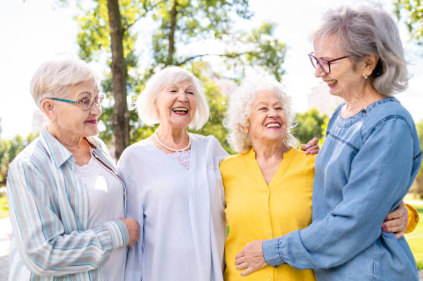 istock Group of seniors people bonding at the park 1431970930