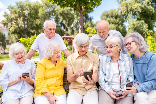 istock Group of seniors people bonding at the park 1431971148