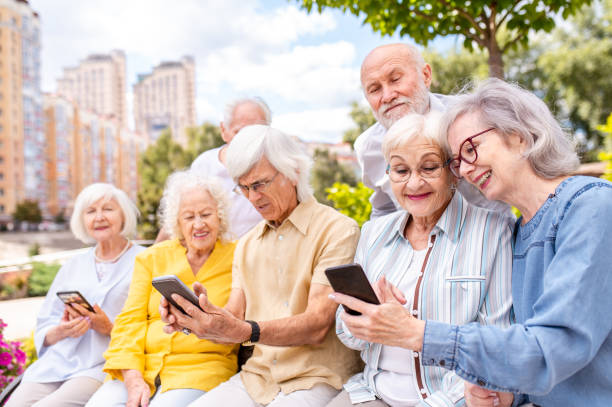 istock Group of seniors people bonding at the park 1431971261
