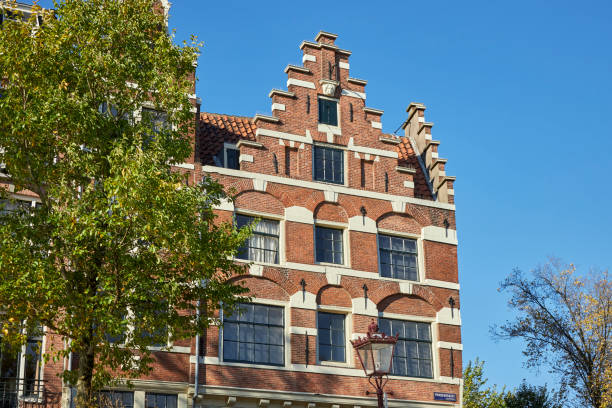 istock Narrow canal houses facade in Amsterdam 1431971341